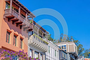 Low angle view of rowhouses with mediterranean and traditional designs in San Francisco, CA