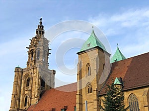 Low angle view of the Saint Kilian`s Church under a blue cloudy sky in Heilbronn in Germany