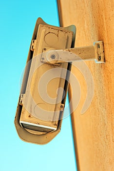 Low angle view of security camera housing