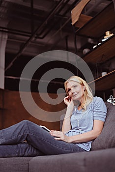 low angle view of smiling middle aged woman