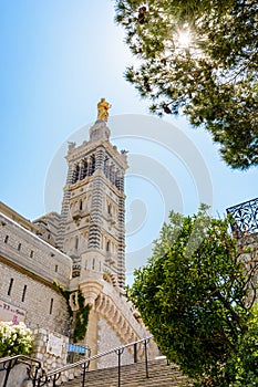 Low angle view of the steeple of Notre-Dame de la Garde basilica in Marseille, France
