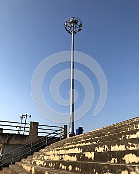 Low angle view of street light post against sky