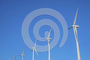 Low angle view of windmills on a desert in California