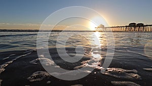 Low Angle of Waves on Beach at Newport Beach California at Sunset