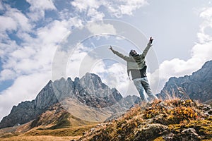 Low angle of woman standing on the rock