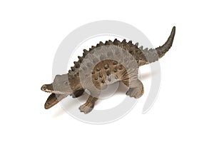 A low back long jaw dinosaur toy figurine