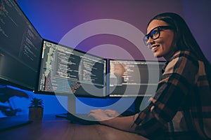 Low below angle view photo of cheerful woman finishing developing computer game solving all the current problems