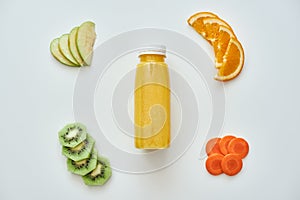 Low callories food. Fresh orange smoothie with fruits isolated in white background