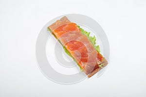 Low caloric open sandwich with salmon. on white background
