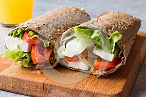 Low Calorie Diet Wrap with Cheese, Tomatoes, Salad and Orange Juice
