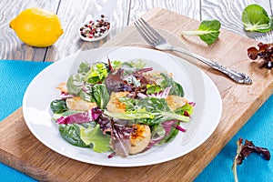 Low-calories salad with chicken breast, lettuce leaves