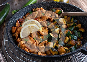 Low carb pan dish with fried chicken breast and roasted zucchini