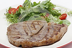 Low carb steak and salad closeup