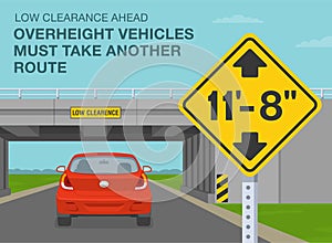 `Low clearance` ahead, overheight vehicles must take another route. Red car is reaching a low bridge.