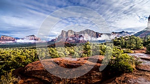 Low Clouds hanging around Munds Mountain and Twin Butte red rock mountains surrounding the town of Sedona