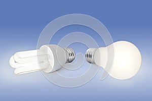 Low energy light bulb against normal light bulb