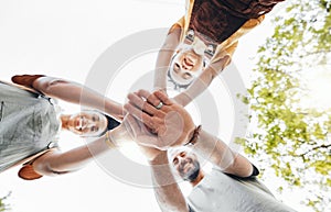 Low, friends and portrait with hands stacked in nature for motivation, team building and success. Happy, together and