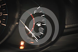 Low Fuel gauge showing fuel dashboard