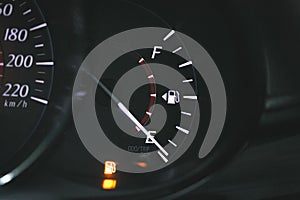 Low Fuel gauge showing fuel dashboard