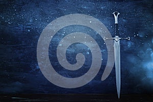 low key banner of silver sword. fantasy medieval period.