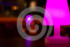 Night club pink purple lamp on table