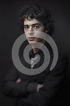 Low key portrait of a young boy