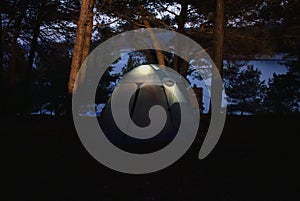 Low light photo of a tent in camp in Istria