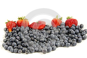 A low look at the fresh sweet blueberry`s and red strawberry`s
