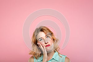 Low mood bored disinterested woman looking up