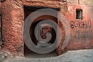 A low narrow public passage in the medina of Marrakech