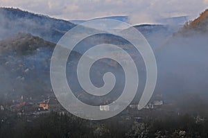 Fuzzy Misty View of the Village in Pre-Balkan Area photo