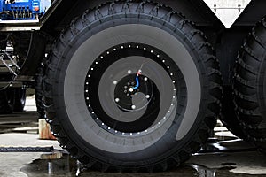 Low pressure tires, with automatic tire pumping system. Extreme patency. Giant Wheels of an all-terrain vehicle. ATV