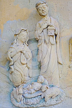 Low relief of Vergin Mary and Jesus Christ in Phitsanulok School ,thailand.