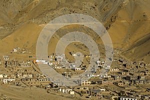 A low-rise village in a deserted mountain valley