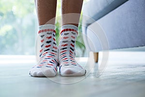 Low section of girl wearing socks