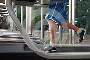 Low section of man on treadmill