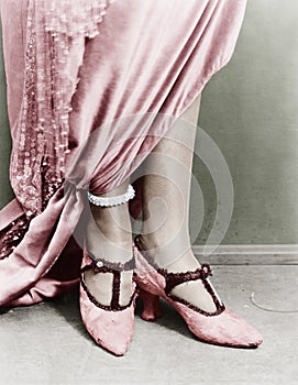 Low section view of a woman wearing shoes