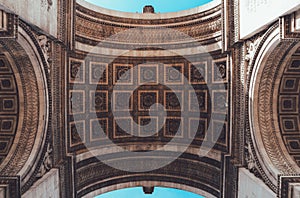 Low shot of a ceiling of the Arc of Triumph in Paris with beautiful engravings on it