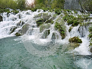 Low shutter speed of beautiful waterfalls, Plitvice lakes national park UNESCO, dramatic unusual scenic, green foliage alpine