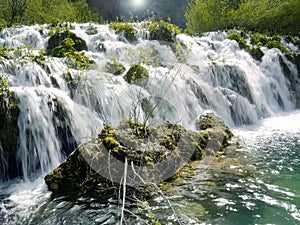 Low shutter speed of beautiful waterfalls, Plitvice lakes national park UNESCO, dramatic unusual scenic, green foliage alpine