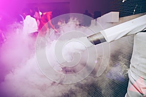 Low smoke effect at the wedding reception. Party entertainment