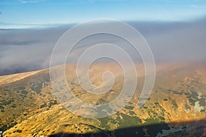 Low Tatras mountain ridge under mist during autumn