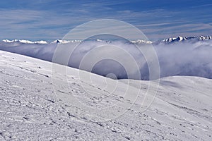 Low Tatras mountains ridge during winter and inversion mist in the valley