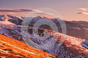 Low Tatras mountains during sunrise from Mala Chochula