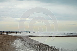 Low tide at the North Sea beach near Katwijk, South Holland, the Netherlands photo