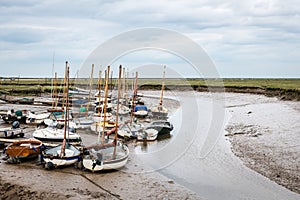 Low tide boats at Blakeney National Nature Reserve