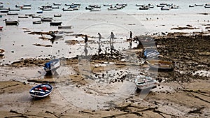 Low tide boats of ocean photo