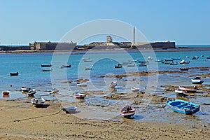 Low Tide at Castle of San Sebastian Cadiz  Spain photo