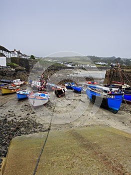 Low tide in the harbor with slipway