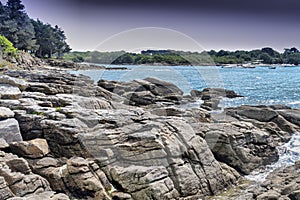 Low tide in Poludlu, Brittany, France, with stong peculiar rocks